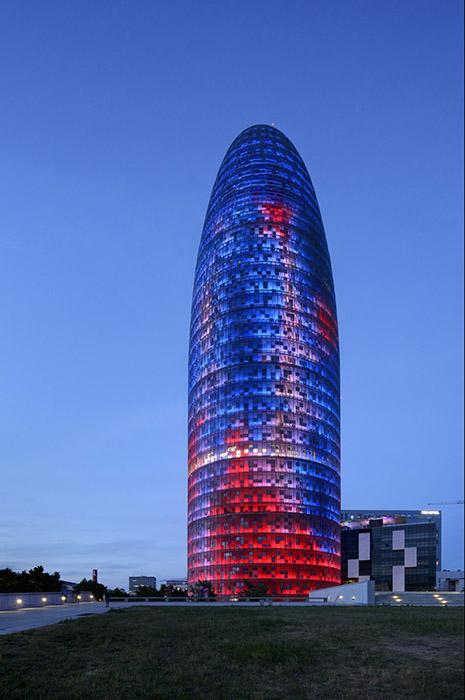 The Torres Glories at Barcelona by Jean Nouvel and its dynamic display of lights at dusk