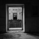 Architecture framed geometrically through a doorway in a palace in Madhya Pradesh