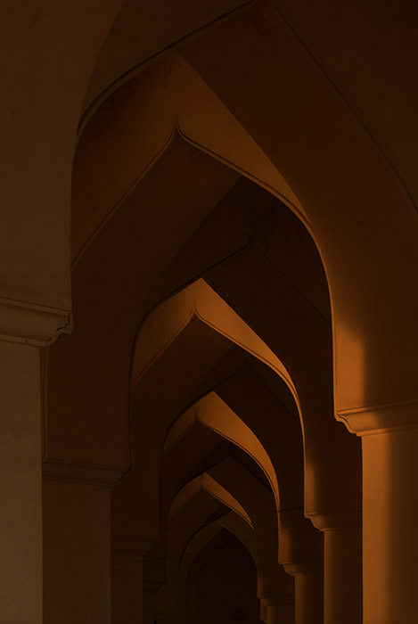 First light hitting the arches in a South Indian Mosque