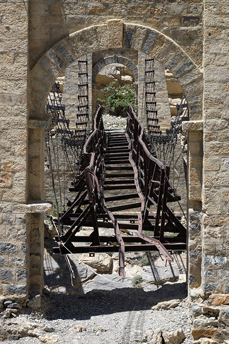An old mangled steel bridge in Spiti, Himachal Pradesh
