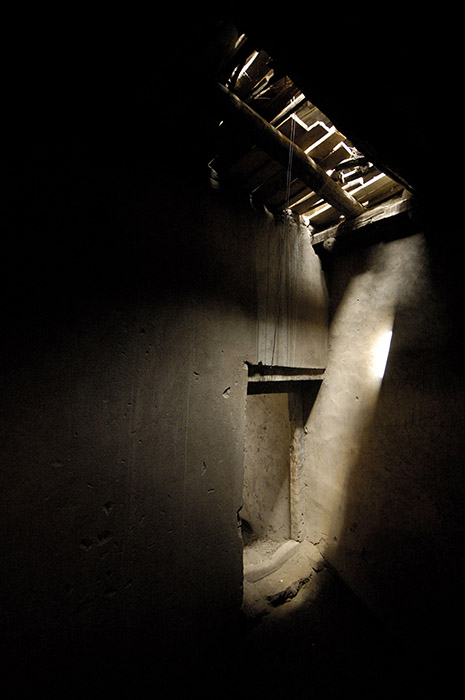 Light from a broken down roof in a heritage building at Ladakh, India